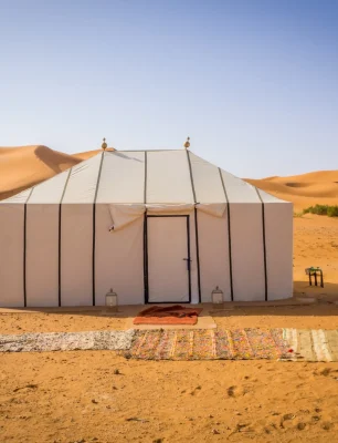 white-berber-tents-sahara-desert-morocco-with-carpets-sandy-ground